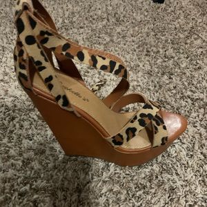 Miss Lola wedge leopard print sandals.